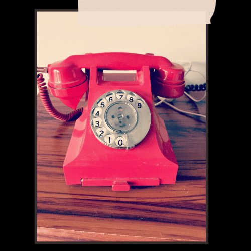 Excellent 1950s red bakelite dial phone