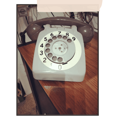 Excellent 1960s gray retro dial phone
